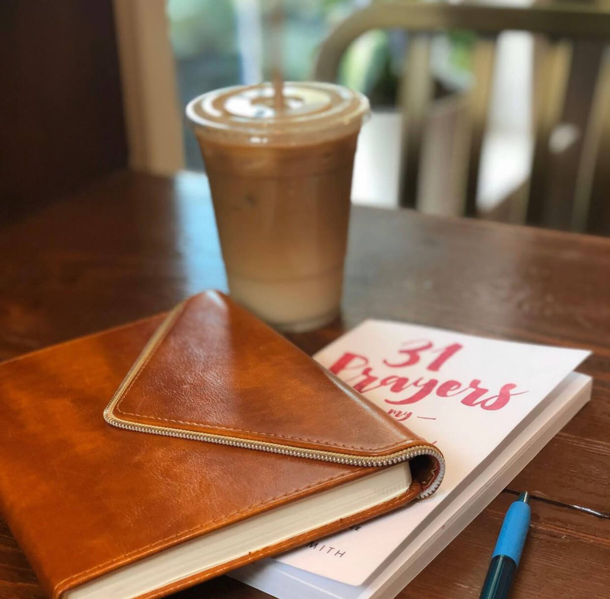 A book next to coffee